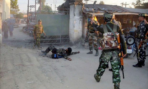 Assam Rifle jawans rush to help an injured colleague after an IED explosion at Keishampat, Imphal on Monday. The injured soldier died late on Monday - PTI Assam Rifle jawans rush to help an injured colleague after an IED explosion at Keishampat, Imphal on Monday. The injured soldier died late on Monday - PTI